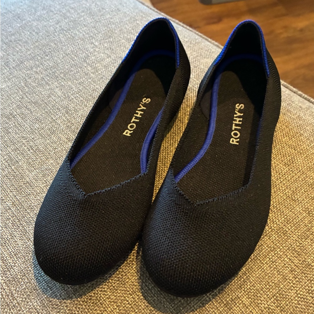 Rothy's Elegant Black Flats with Blue Trim
